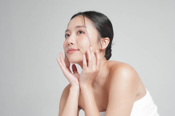 Nurse using a simple skincare routine during a break on a night shift”

