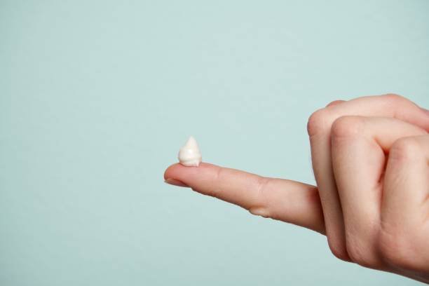 small pea sized amount of moisturizer on fingertip showing correct product amount to prevent skincare pilling
Caption: A pea-sized amount of moisturizer is enough for your whole face. More product equals more pilling, not better hydration.