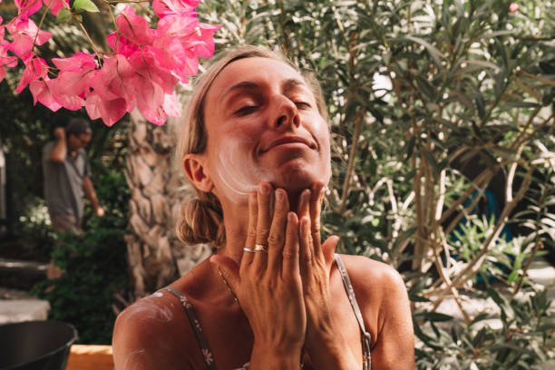 evening self tanner application as part of PM summer skincare routine before bed
