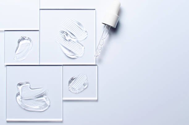 hyaluronic acid serum dropper next to moisturizer cream showing correct application order. Hyaluronic Acid Before or After Moisturizer