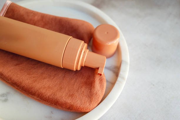self tanning routine products for beginners including mitt exfoliator and self tanner