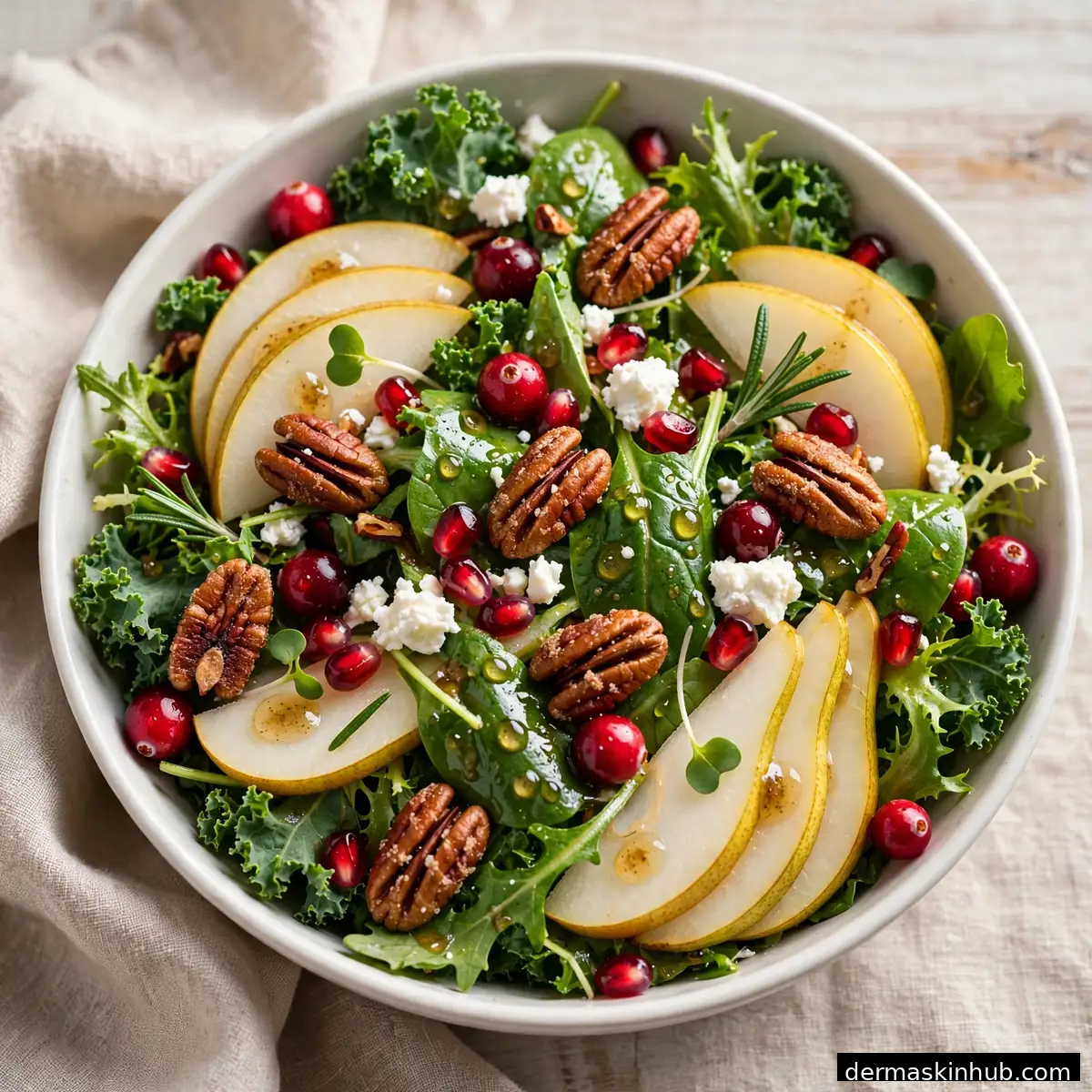 Bright Christmas salad with pears, cranberries and pecans
